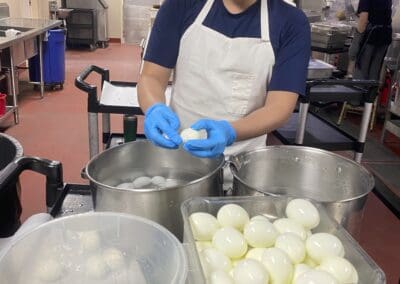 Staff peeling eggs.