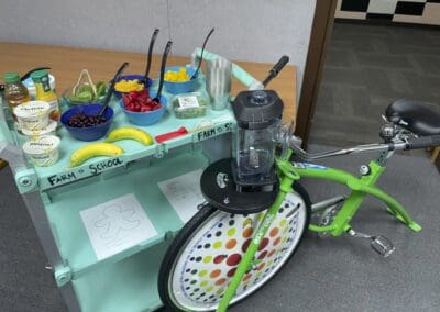 Smoothie bike with fresh ingredients.